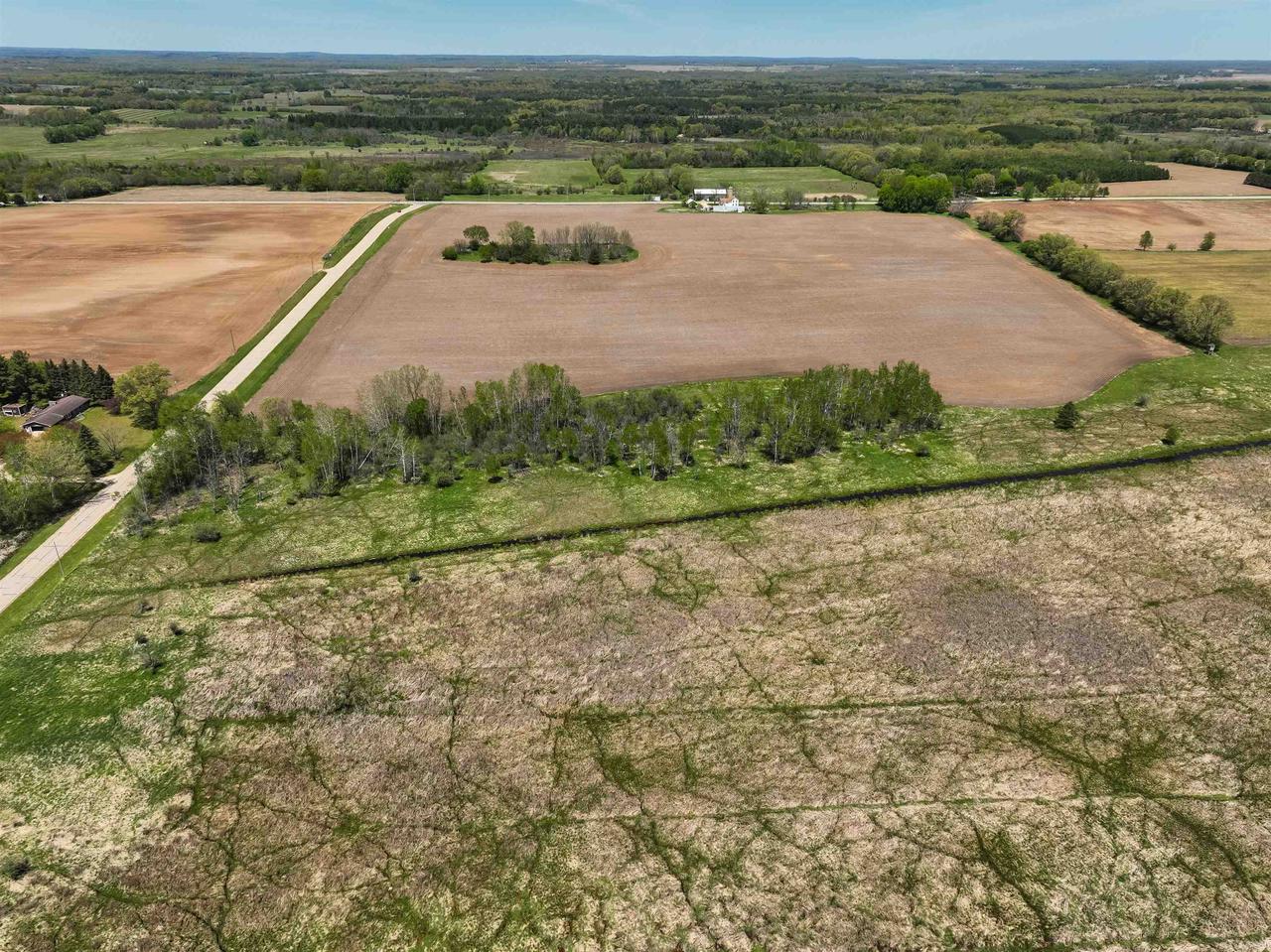 100 acres County J Road