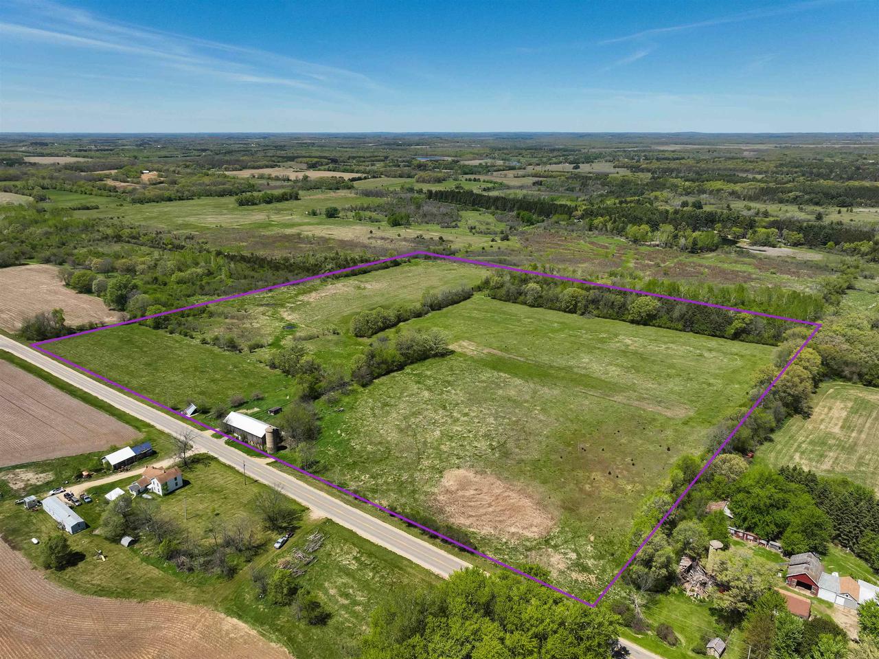 100 acres County J Road