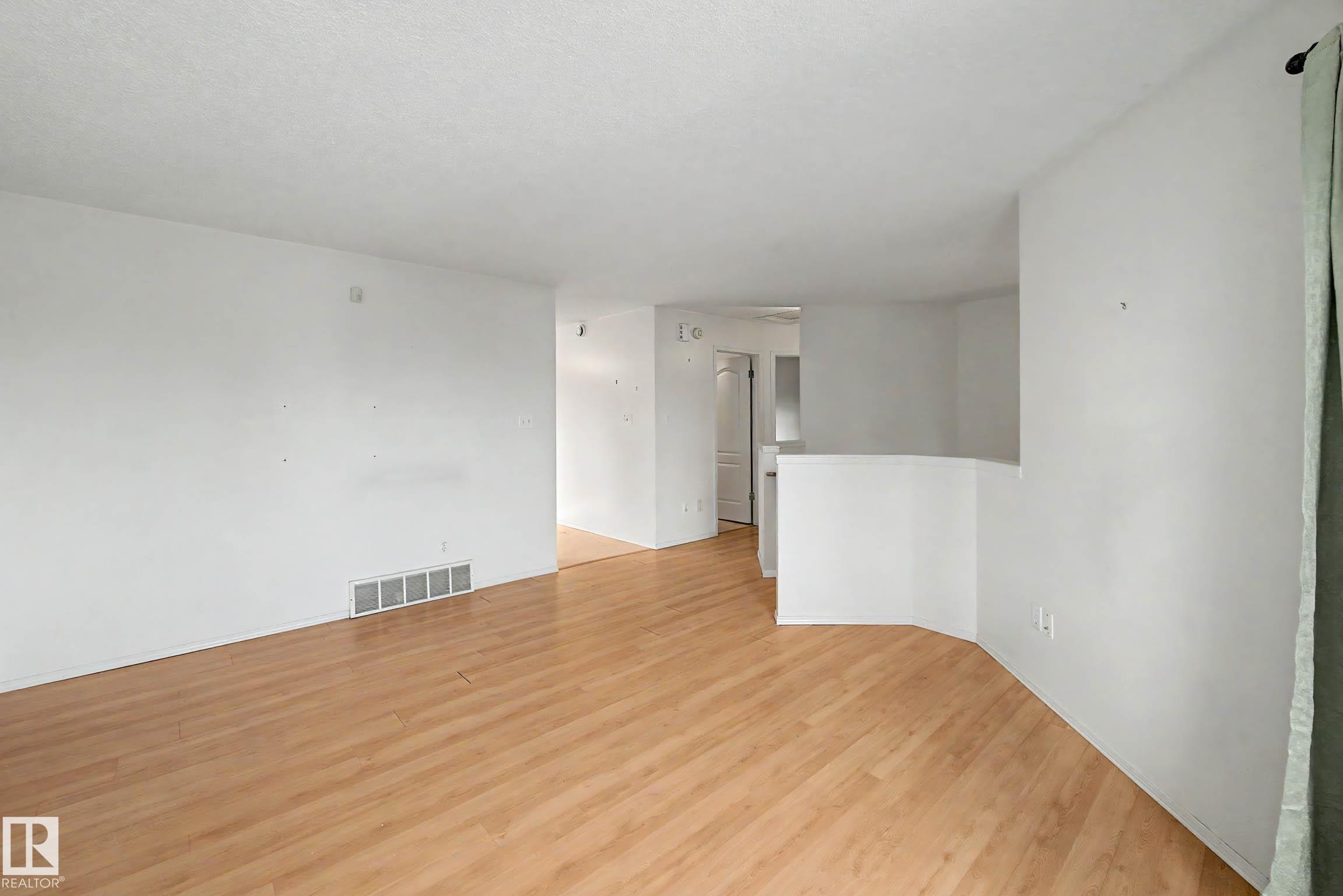 18411 77 AV NW