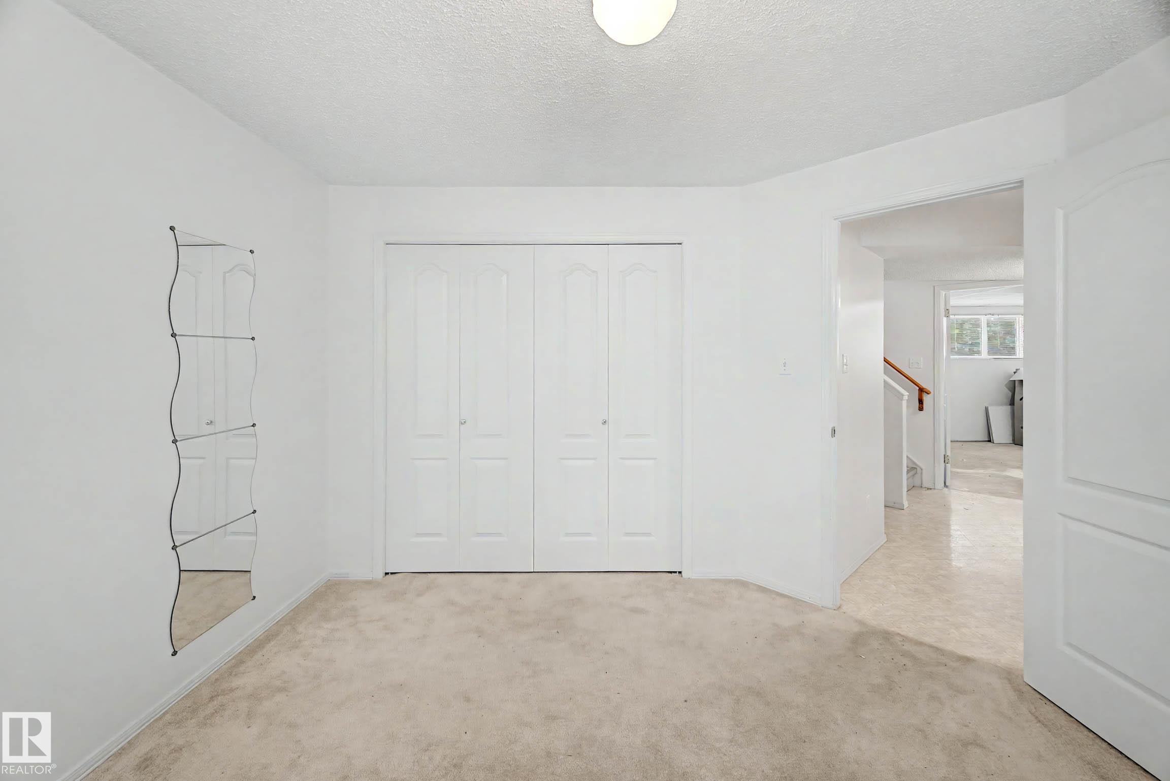 18411 77 AV NW