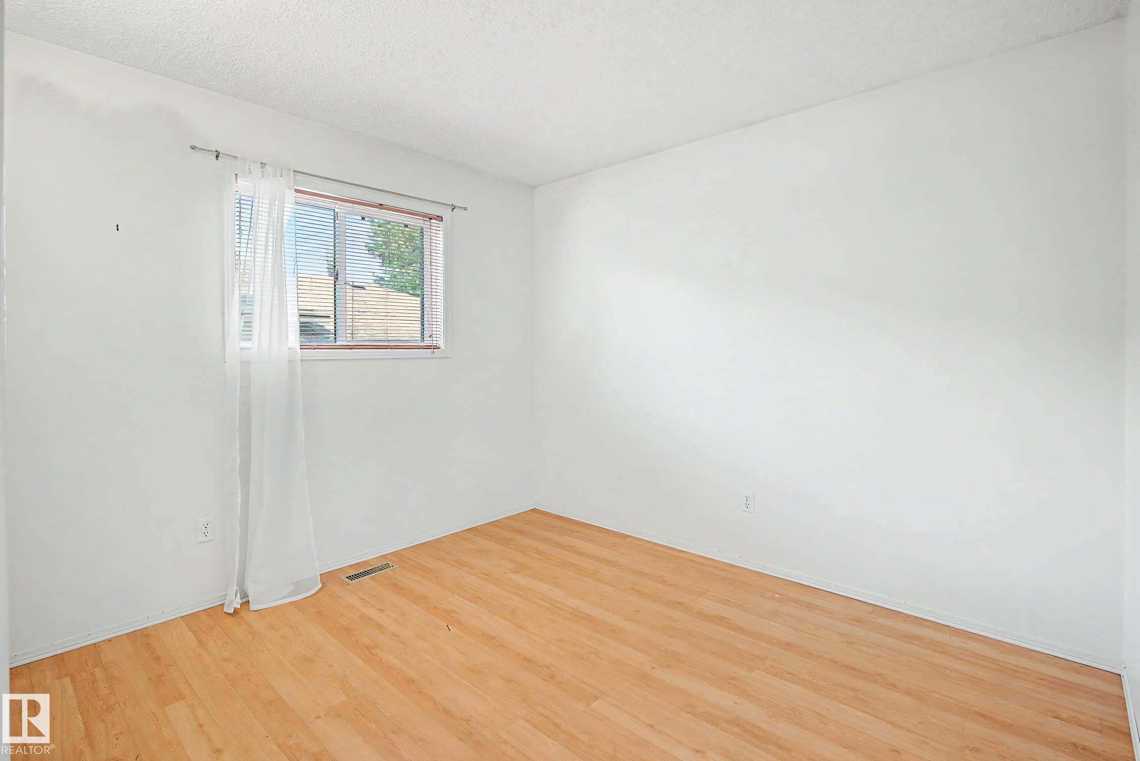 18411 77 AV NW