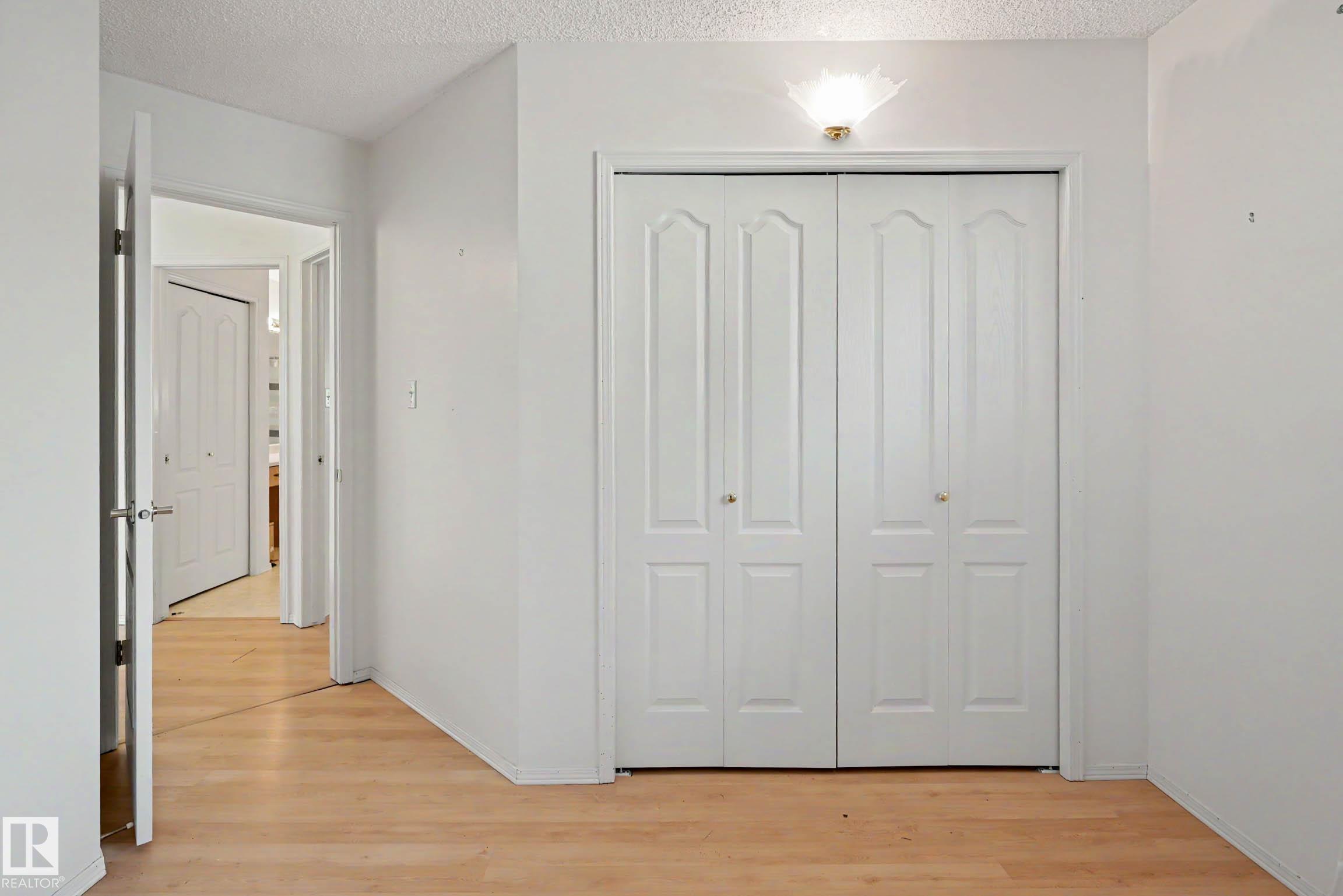 18411 77 AV NW