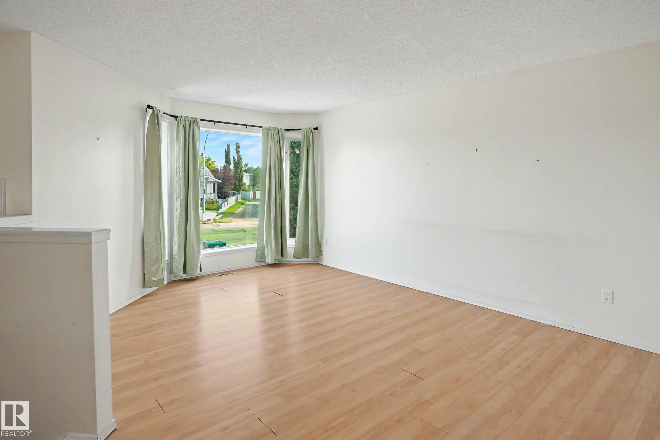 18411 77 AV NW