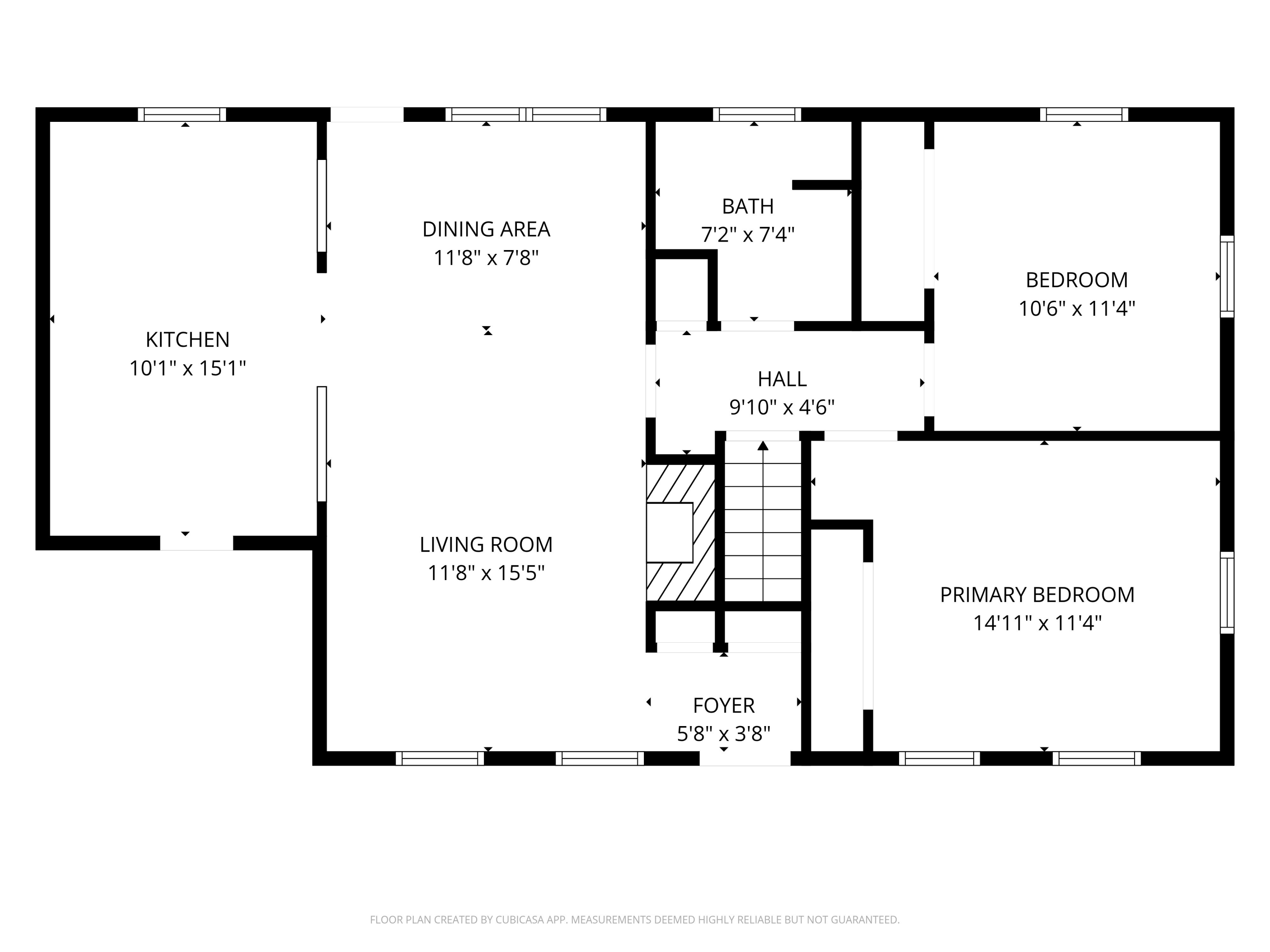 Floor plan showing a kitchen, dining area, living room, two bedrooms, bath, hall, and foyer.
