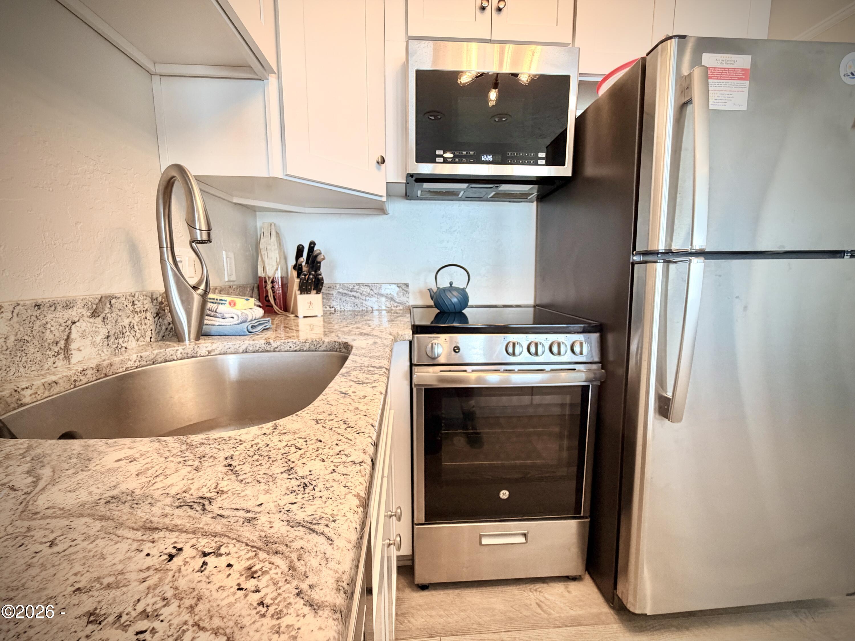 701 NW Coast Street, 207