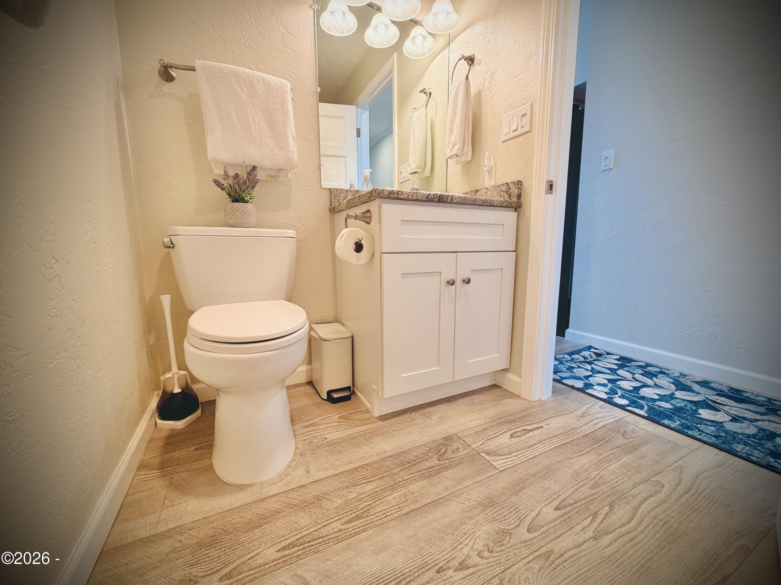 701 NW Coast Street, 207