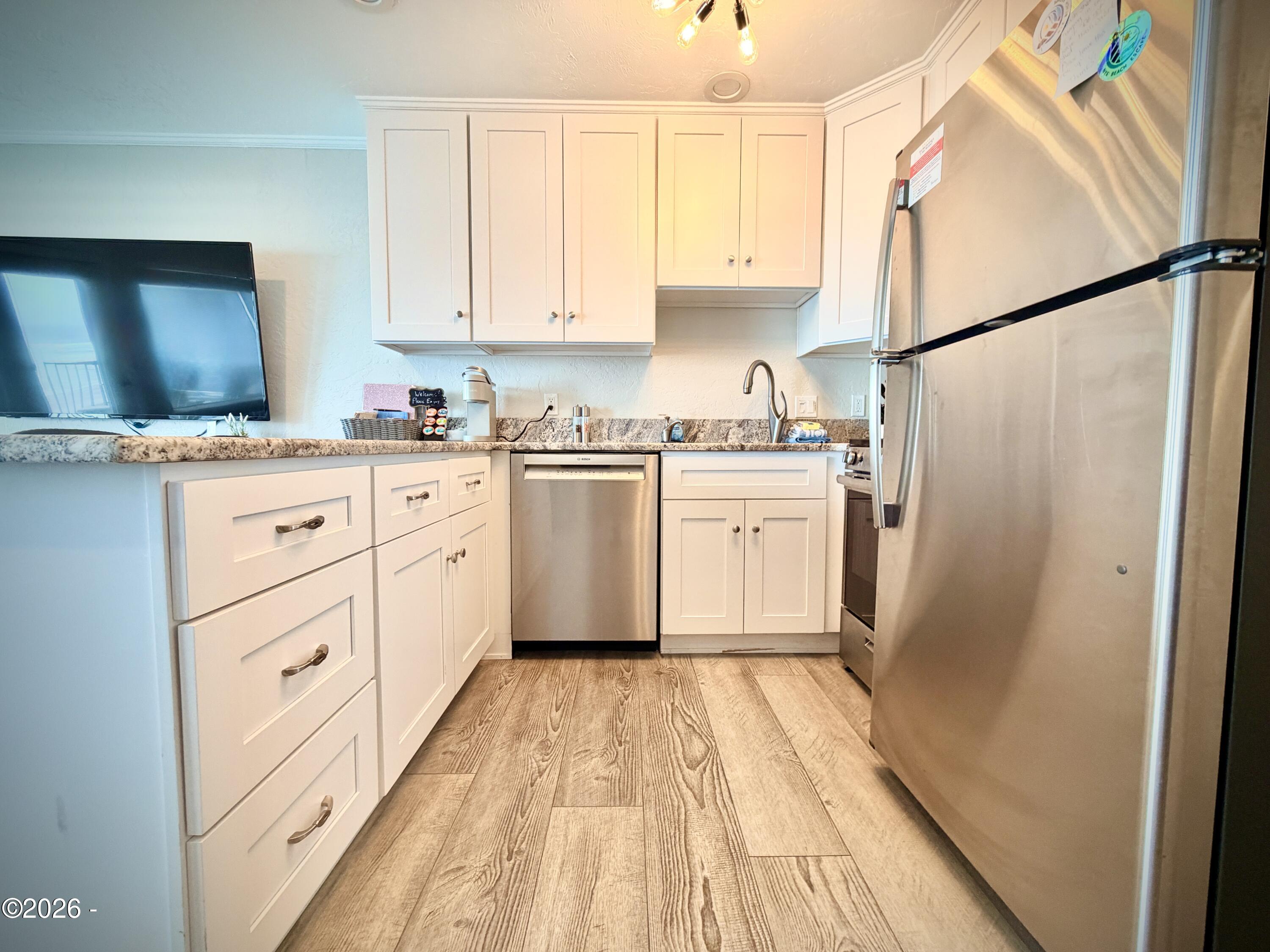 701 NW Coast Street, 207