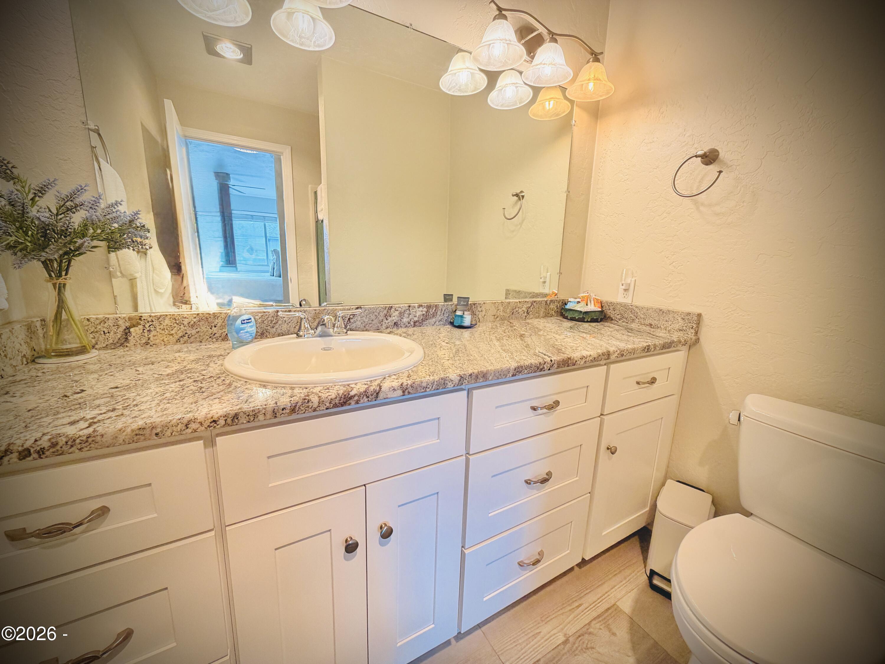 701 NW Coast Street, 207