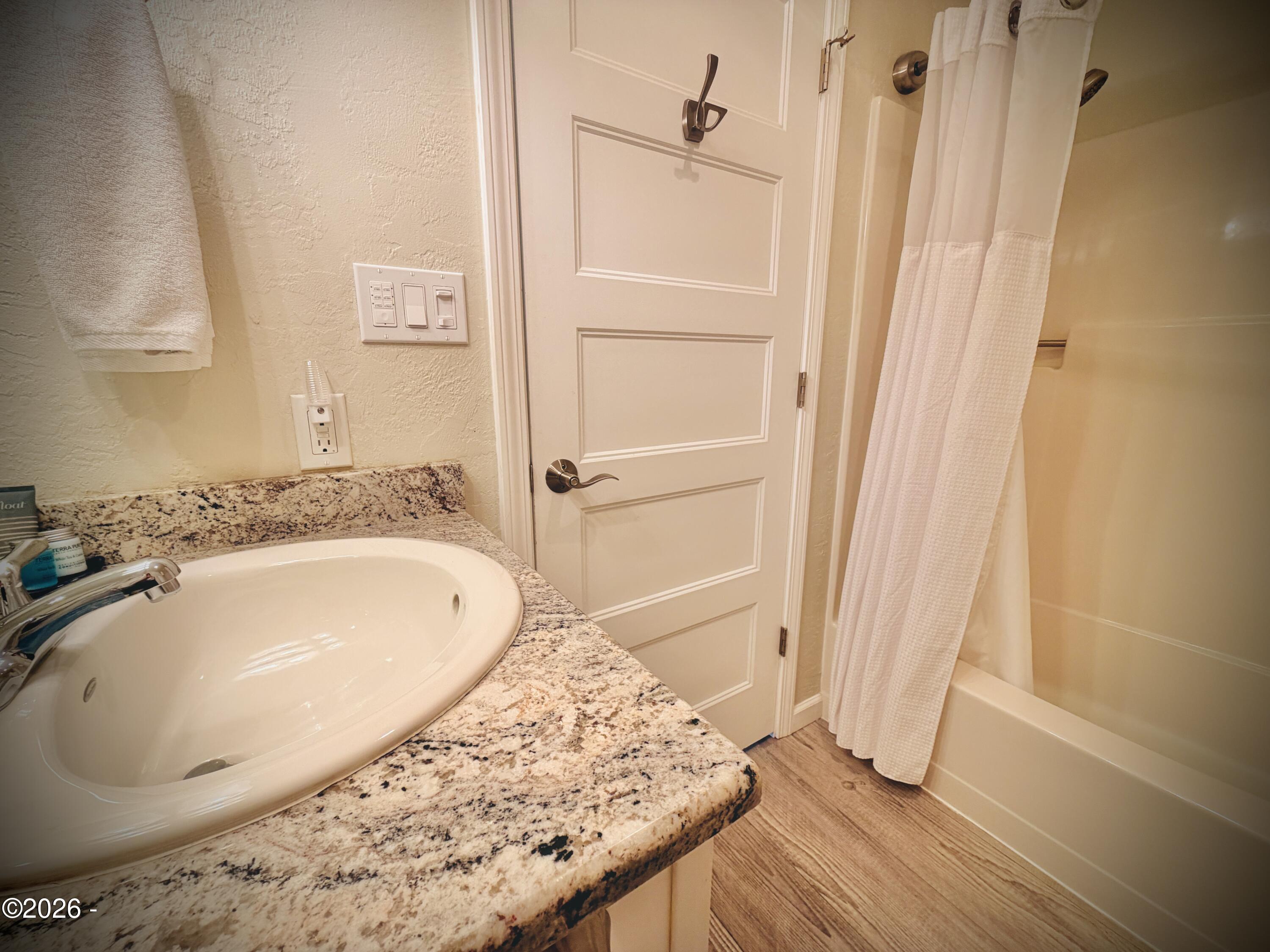 701 NW Coast Street, 207