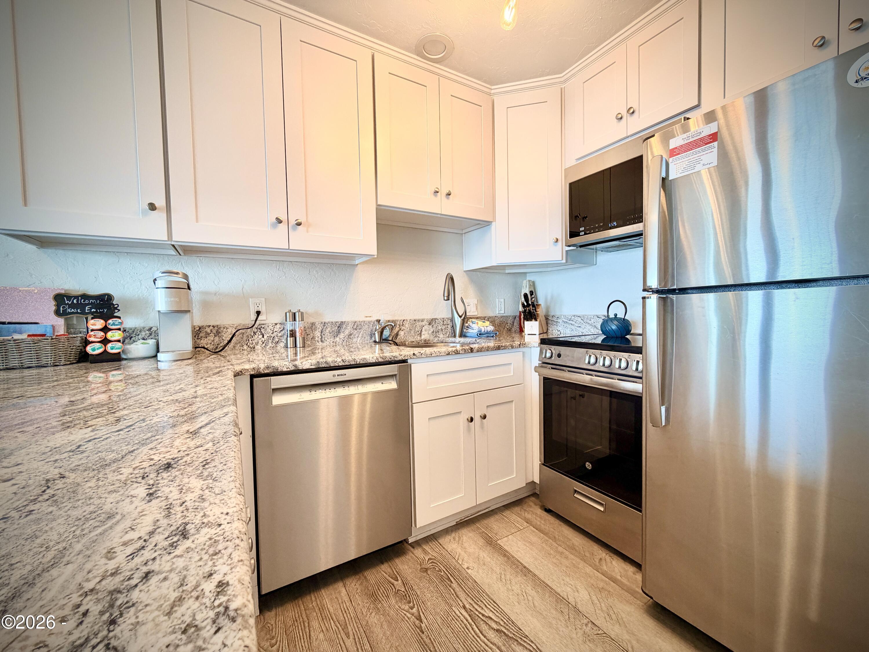 701 NW Coast Street, 207