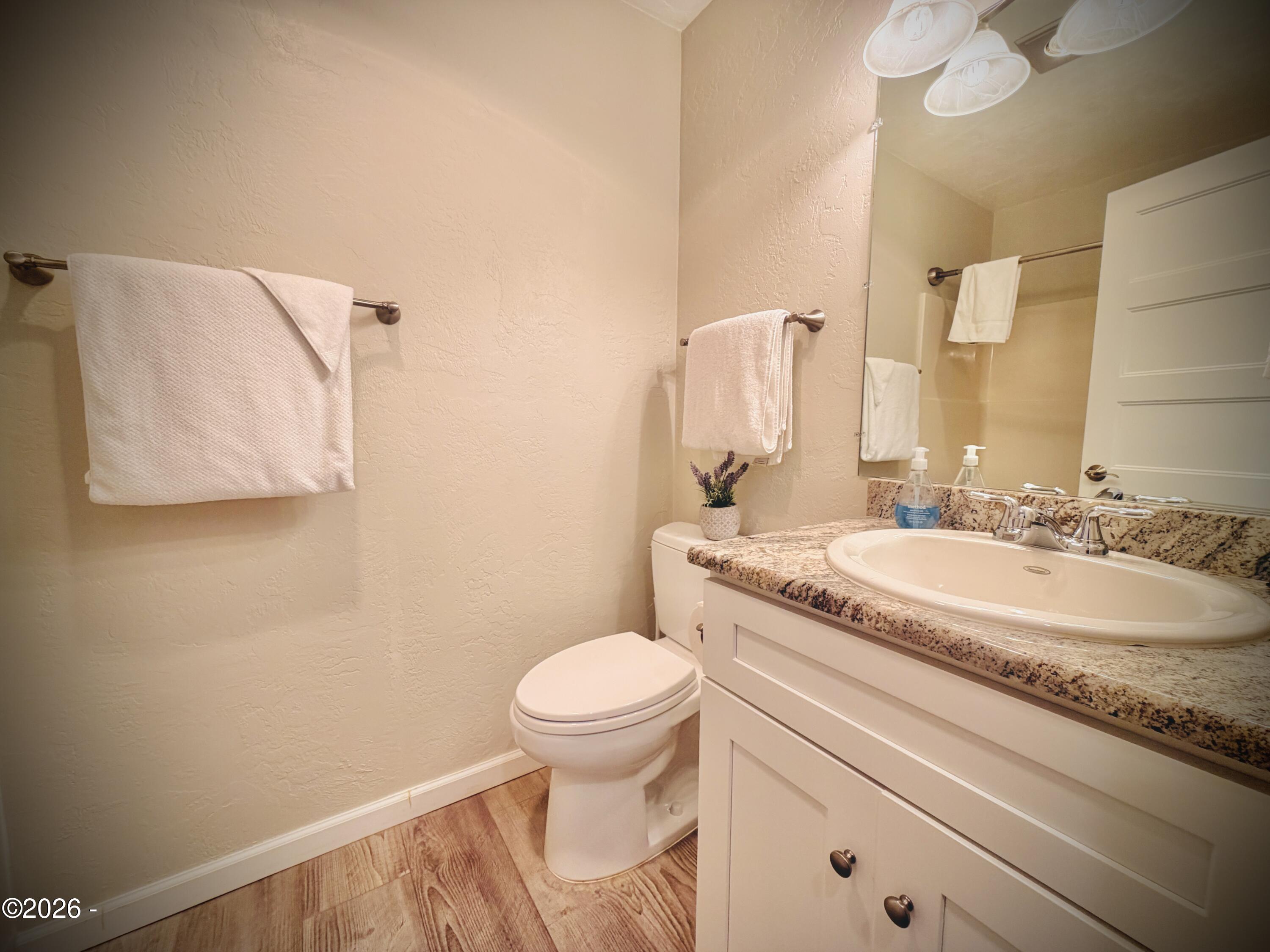 701 NW Coast Street, 207