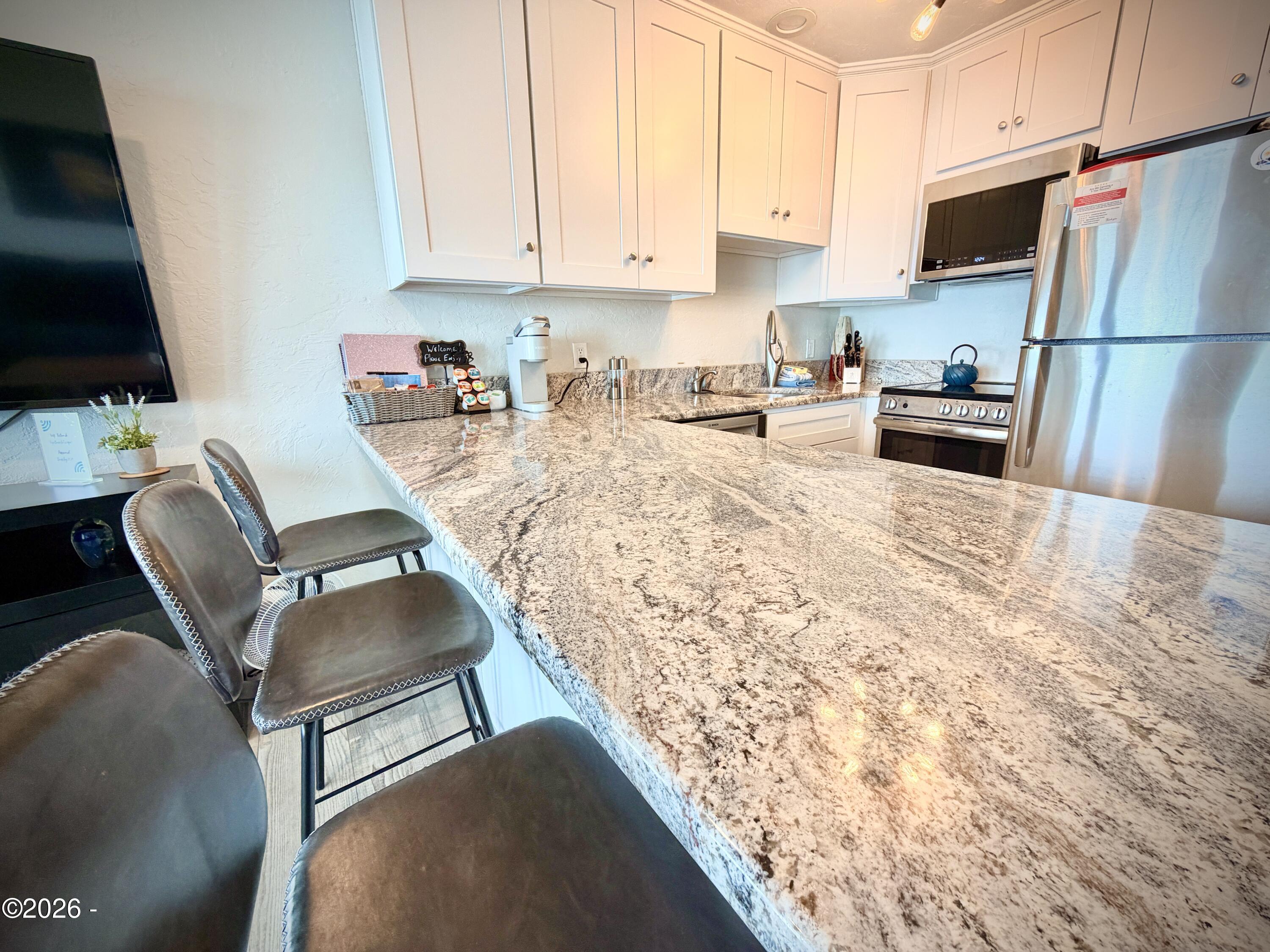 701 NW Coast Street, 207