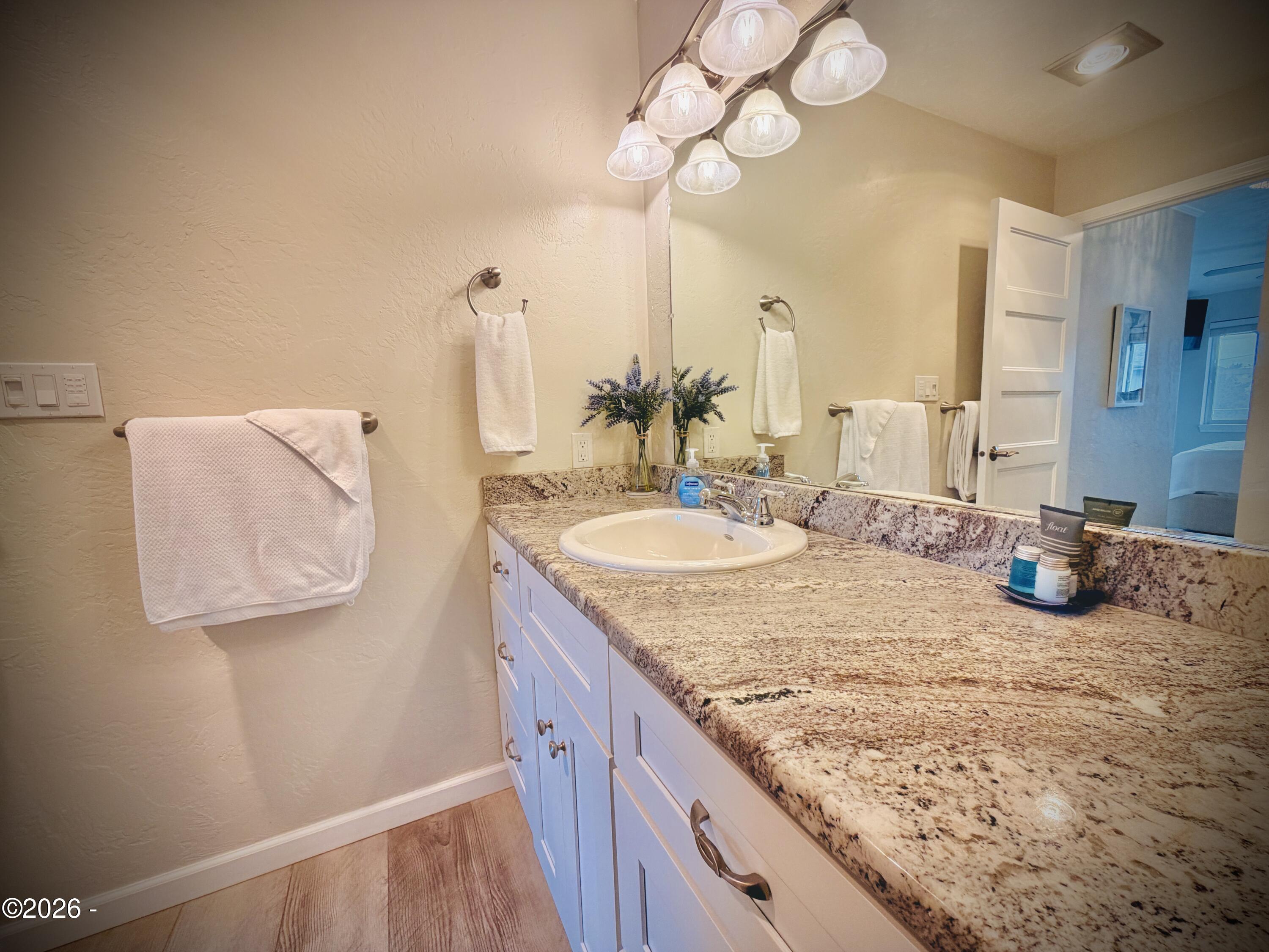 701 NW Coast Street, 207