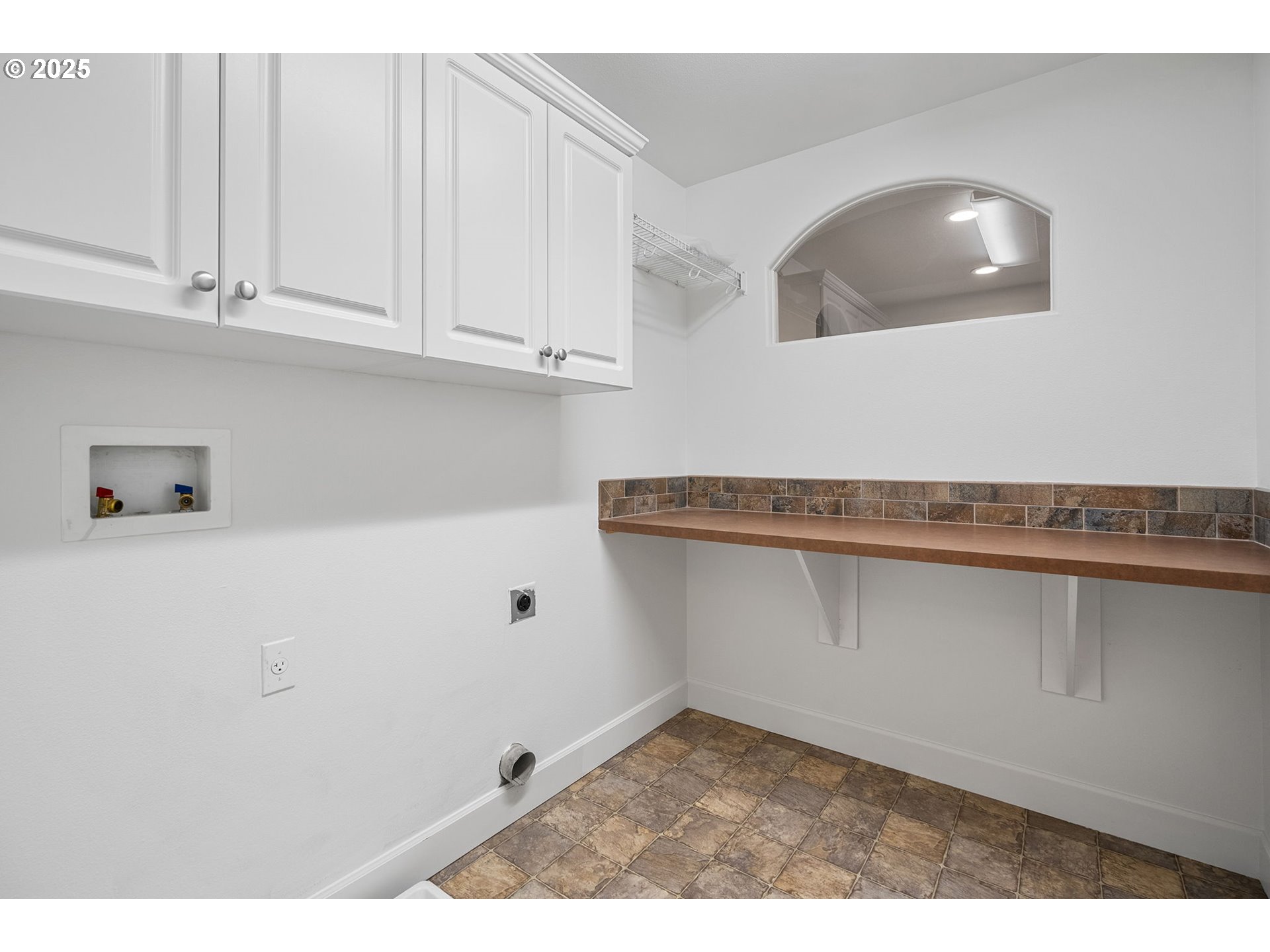 647 NW 28TH ST