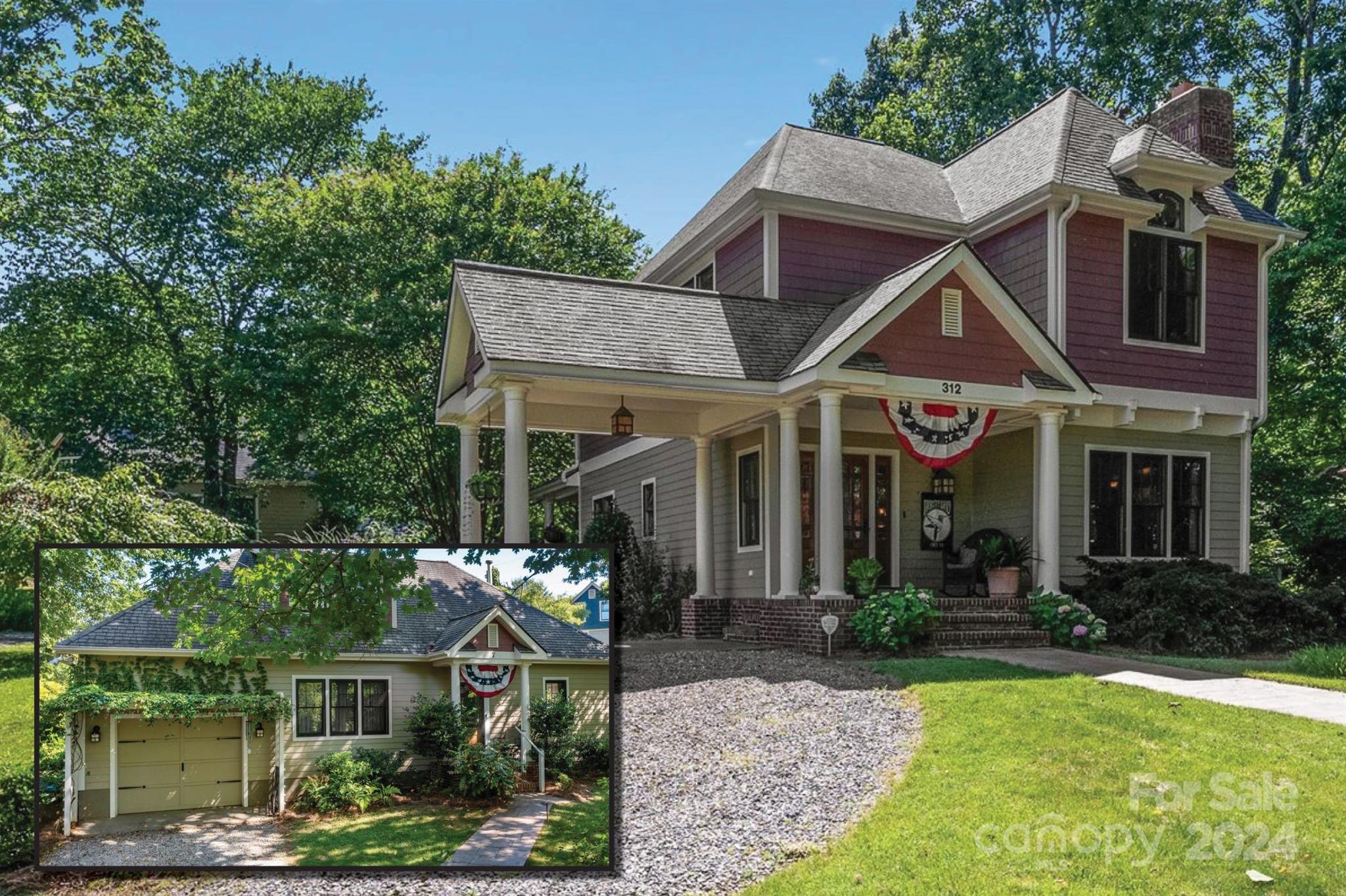 Two-story burgundy and gray house with a columned porch, patriotic bunting, mature trees, and gravel drive.
