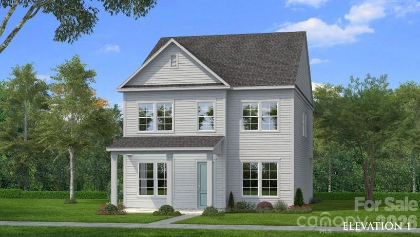 Gray two-story house with a covered front porch, green lawn, and trees.